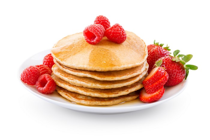 Pancakes with Raspberries and Strawberries on a Plate