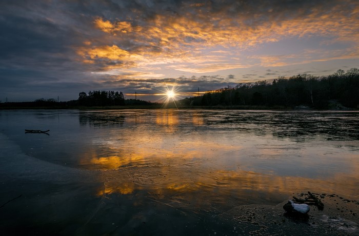 Sunset over a frozen lake in Sweden