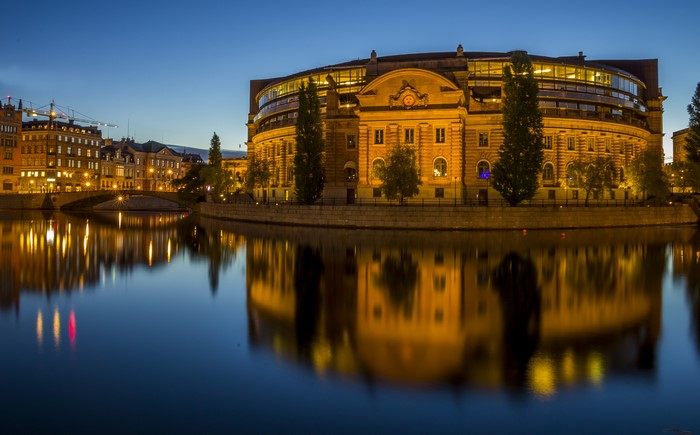 Riksdag Building and River in Stockholm, Sweden at Dusk