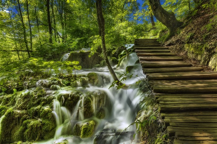 Wooden walkway along waterfalls in Plitvice Lakes National Park, Croatia