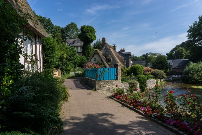 Street with thatched houses in Veules Les Roses, France
