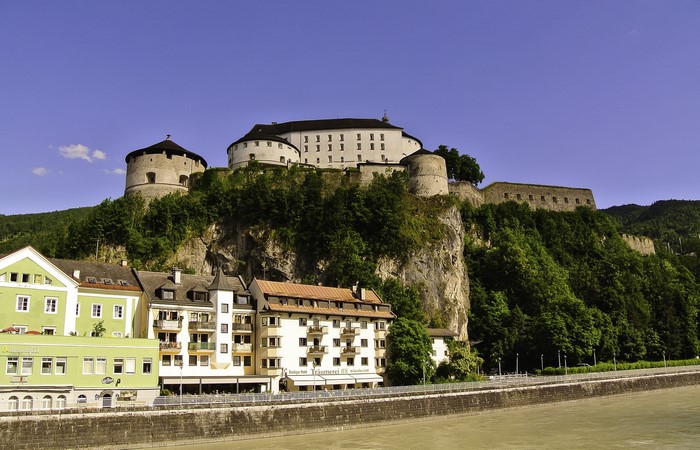 Kufstein Fortress and town on a cliff overlooking a river