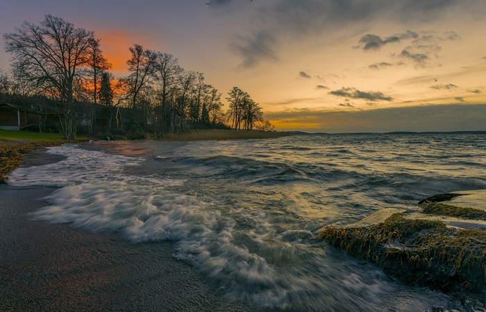 Sweden Coast at Sunset with Waves