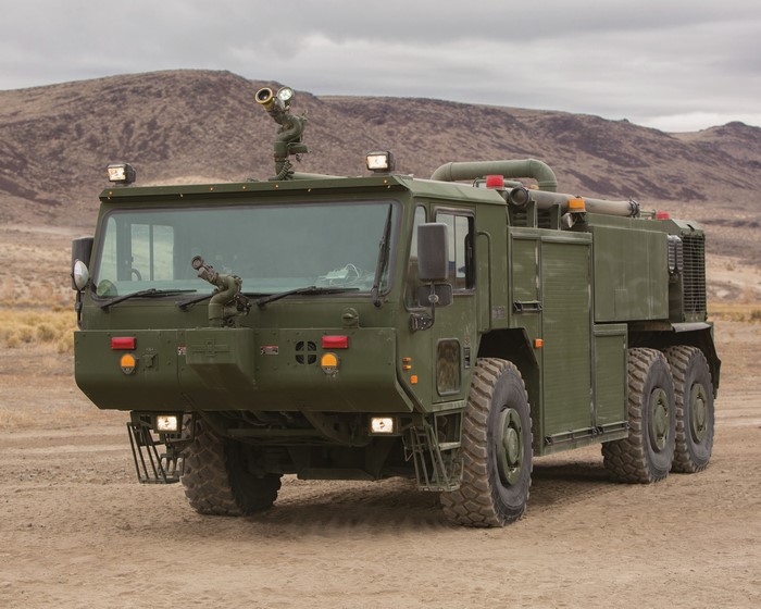 Oshkosh P19R fire engine in desert landscape