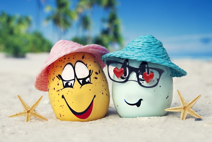Summer Eggs with Hats and Glasses on Beach