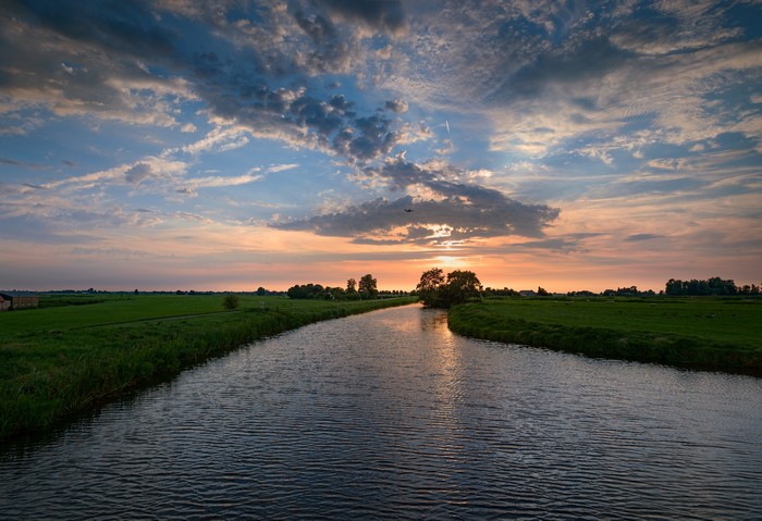 Sunset over a river in De Hoef Utrecht, Netherlands