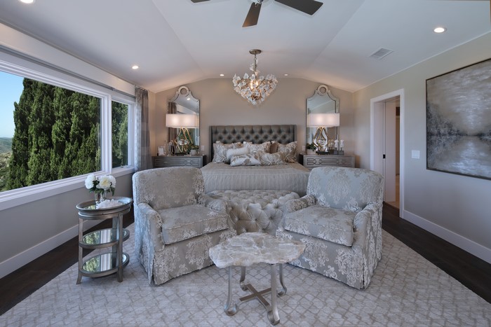 Luxury Bedroom with Tufted Bed and Armchairs