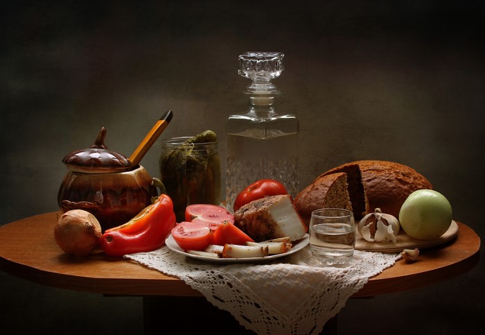 Still-life with bread, vegetables, salo, and vodka