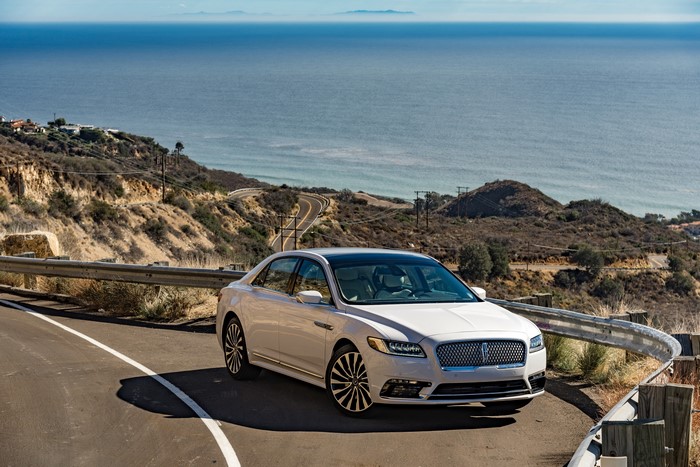 White 2017 Lincoln Continental on a Coastal Road