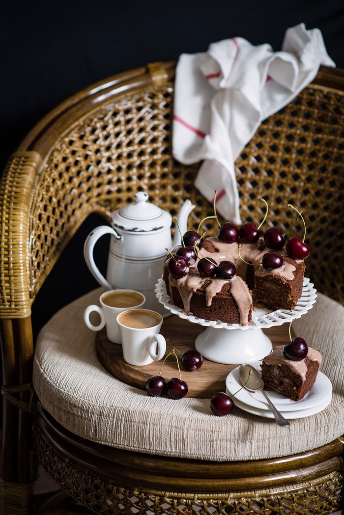 Chocolate cake with cherries and coffee