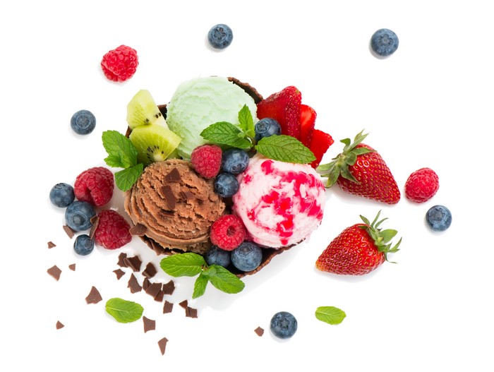 Ice cream with berries and chocolate shavings