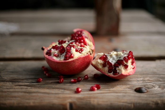 Pomegranate on a wooden table