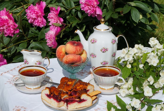 Tea set with pie, peaches, and peonies