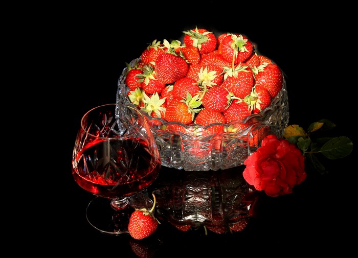 Still-life of strawberries, wine, and a red rose