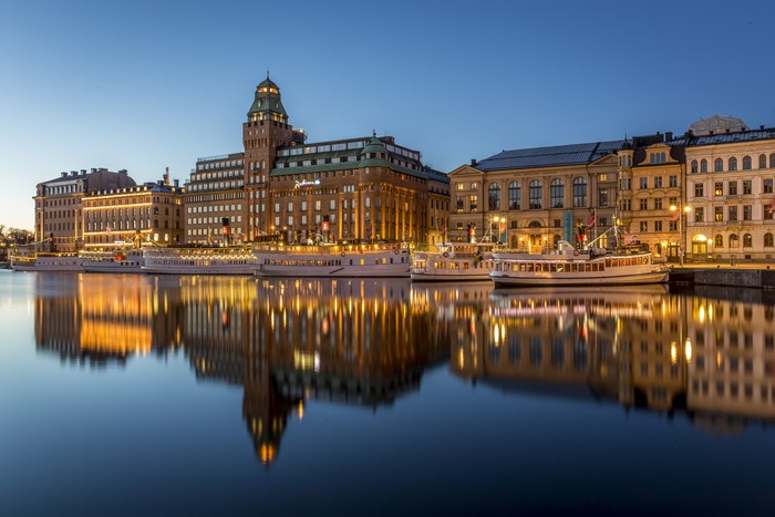 Stockholm, Sweden Waterfront at Dusk with Boats