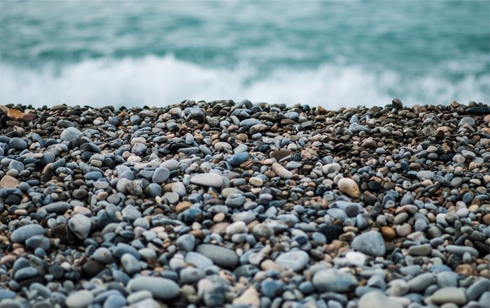 Pebble beach with ocean waves