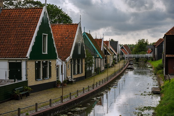 Houses along a canal in Kolhorn, Netherlands