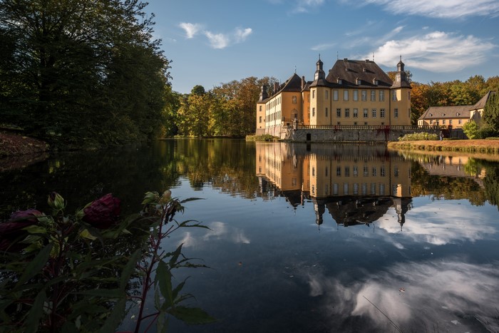 Castle Dyck reflected in a pond in Germany