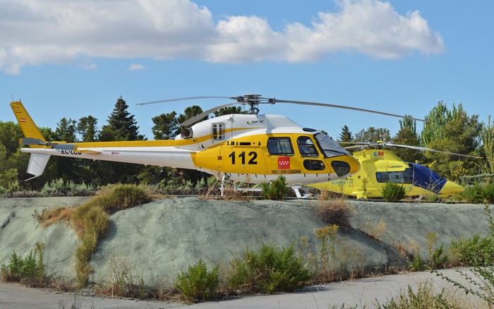 Two helicopters parked outdoors