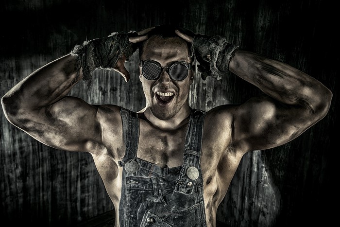 Man with goggles and overalls