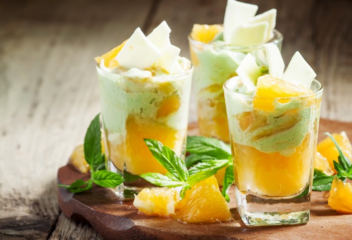 Dessert in glasses with orange and mint