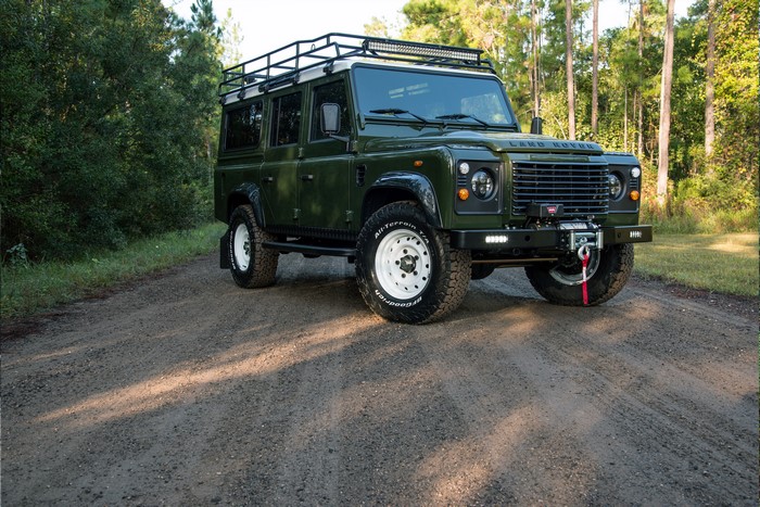 4K Green Land Rover Defender with Roof Rack