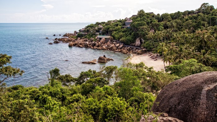 4K Tropical Beach with Rocky Coastline and Palm Trees in Thailand
