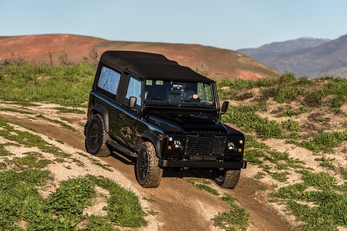 4K Black Land Rover Defender on Dirt Road