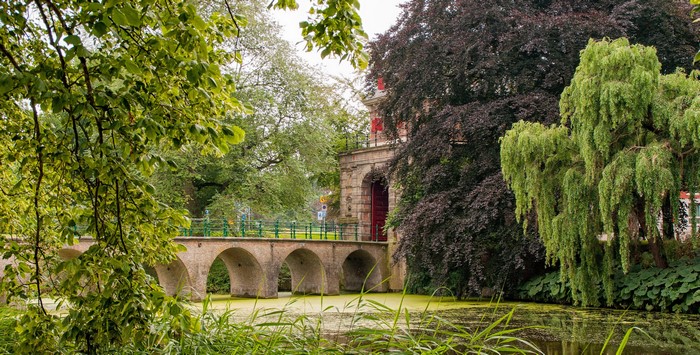 Oosterpoort Hoorn bridge over water with trees