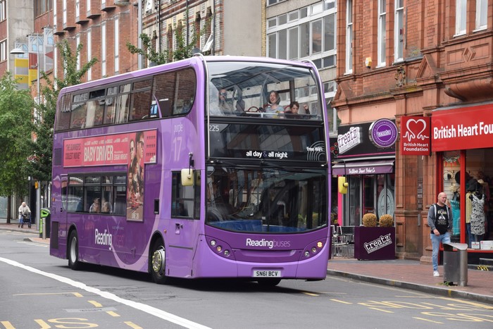 Purple Reading Buses double-decker bus with Baby Driver advertisement