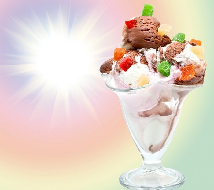 Ice cream sundae with marmalade and light rays
