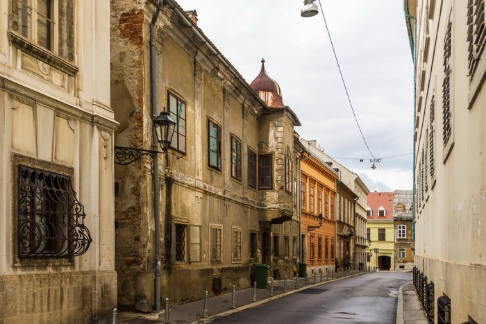 Street in Zagreb, Croatia with old houses and street lights