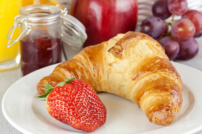Croissant with Strawberry and Grapes