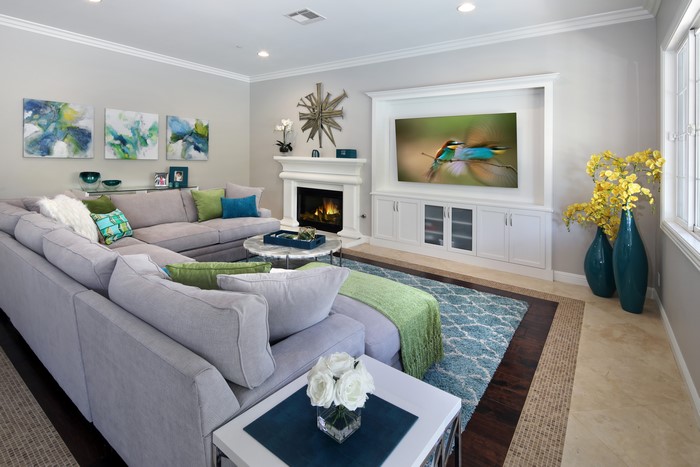 Living room with sectional sofa and fireplace