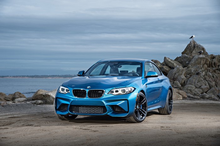 Blue BMW M2 F87 Coupe on a Beach