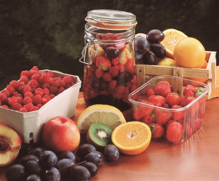 Fruit assortment with jar of preserves
