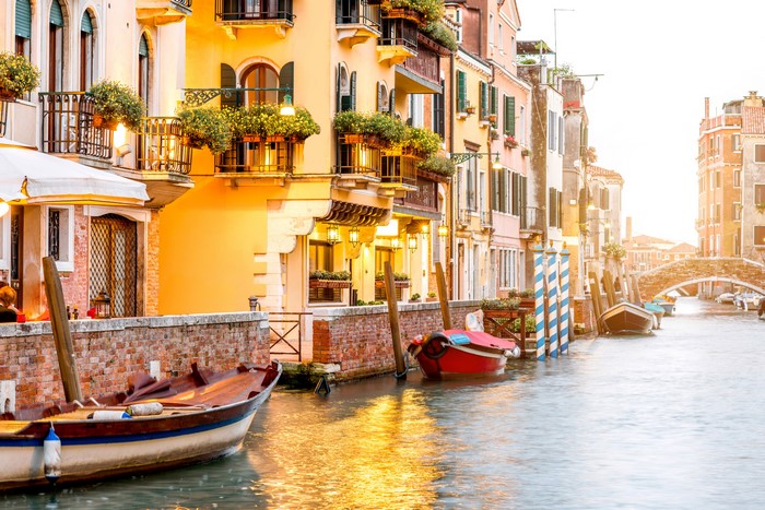Venice Canal with Boats and Buildings at Sunset