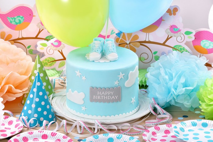 Birthday Cake with Baby Shoes and Balloons
