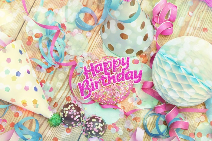 Happy Birthday donut with party decorations