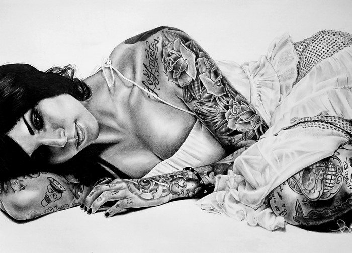 Pencil drawing of a tattooed woman lying down