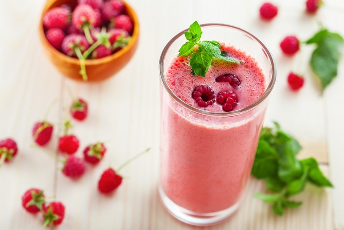 Raspberry Smoothie in Highball Glass with Fresh Raspberries