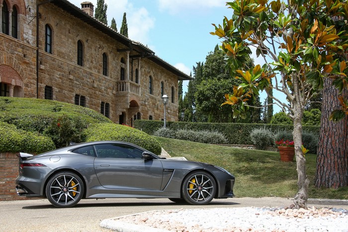 Jaguar F-Type SVR Coupe in front of a stone building