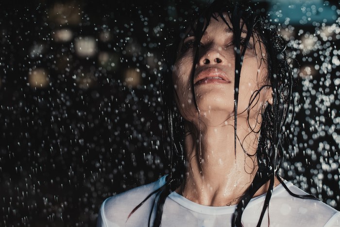 Brunette girl in the rain