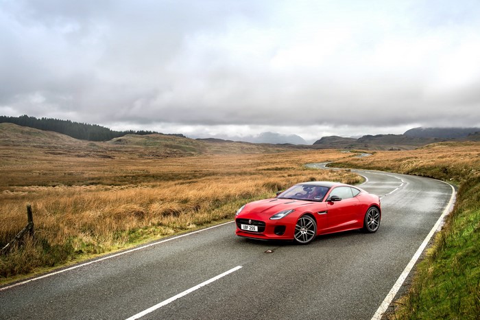 Red 2017 Jaguar F-Type R-Dynamic Coupe on a road