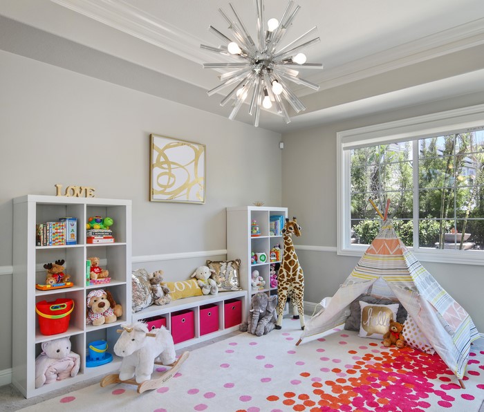 Children's room interior design with toys and chandelier