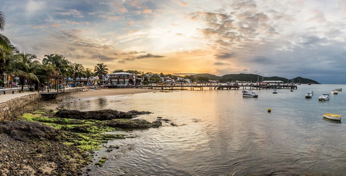 Coastal town with boats at sunset in Rio de Janeiro