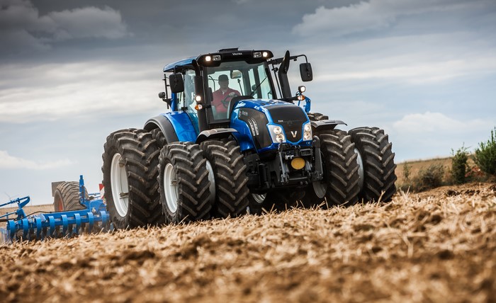 Valtra T213 Tractor Plowing a Field