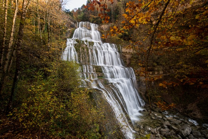 Cascade du Herisson waterfall in France during autumn