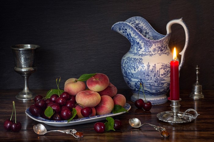 Still-life with peaches, cherries, jug, and candle