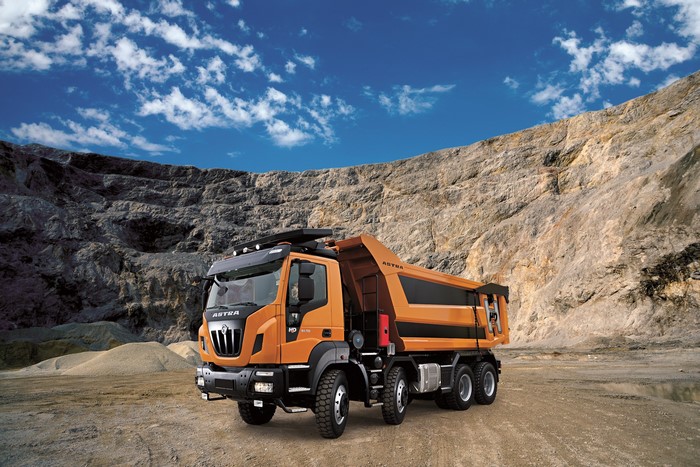 Orange Astra HD dump truck in a quarry